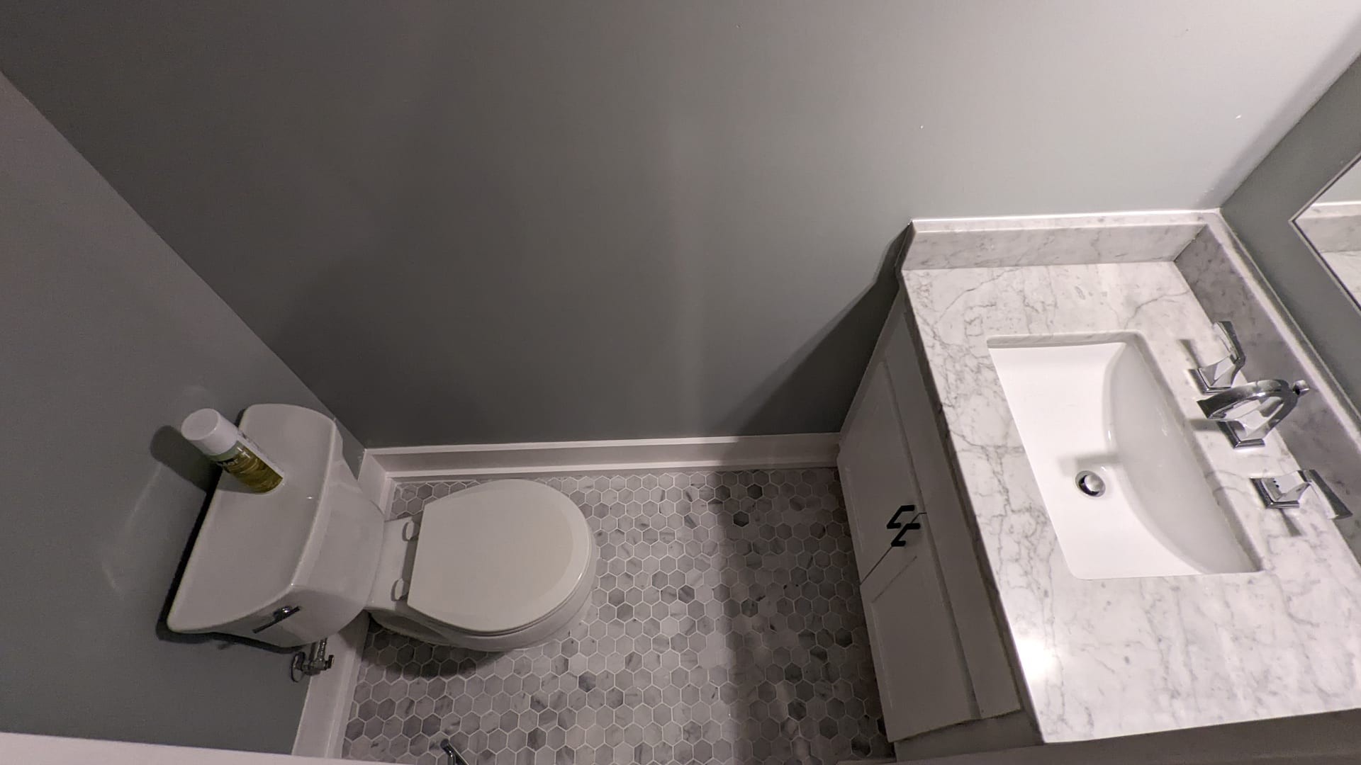 Custom Waterproofed Bath Rebuild — Complete bathroom reconstruction featuring updated waterproofing, custom tile, and vanity.
